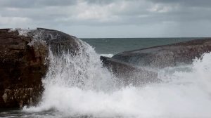 Bunkers battered by the surf and currents