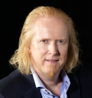 Paul Ottoson, a man with blonde hair and a goatee