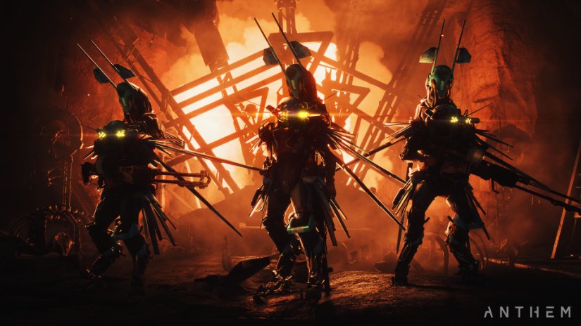 Otherworldy bug-like soldiers congregate in a firey, smoky cave.