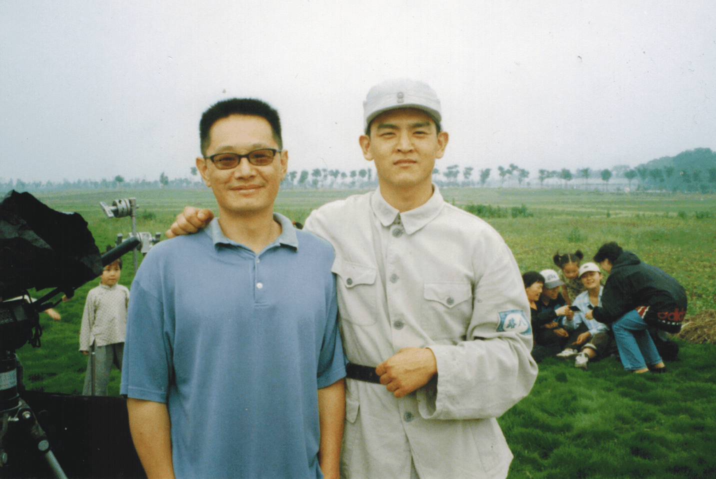 John Dunn with John Cho on the set of Pavilion of Women 1999
