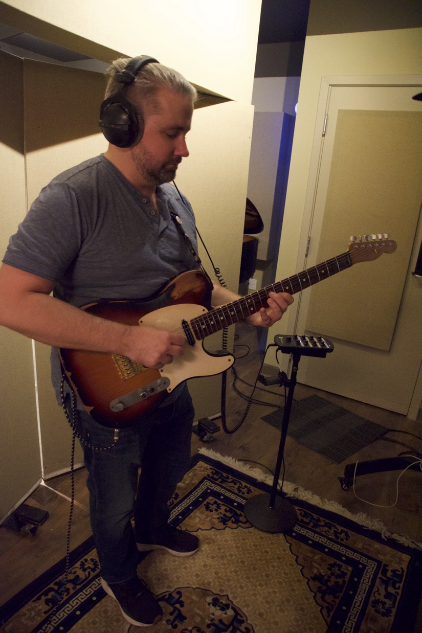 Ben Hicks playing electric guitar