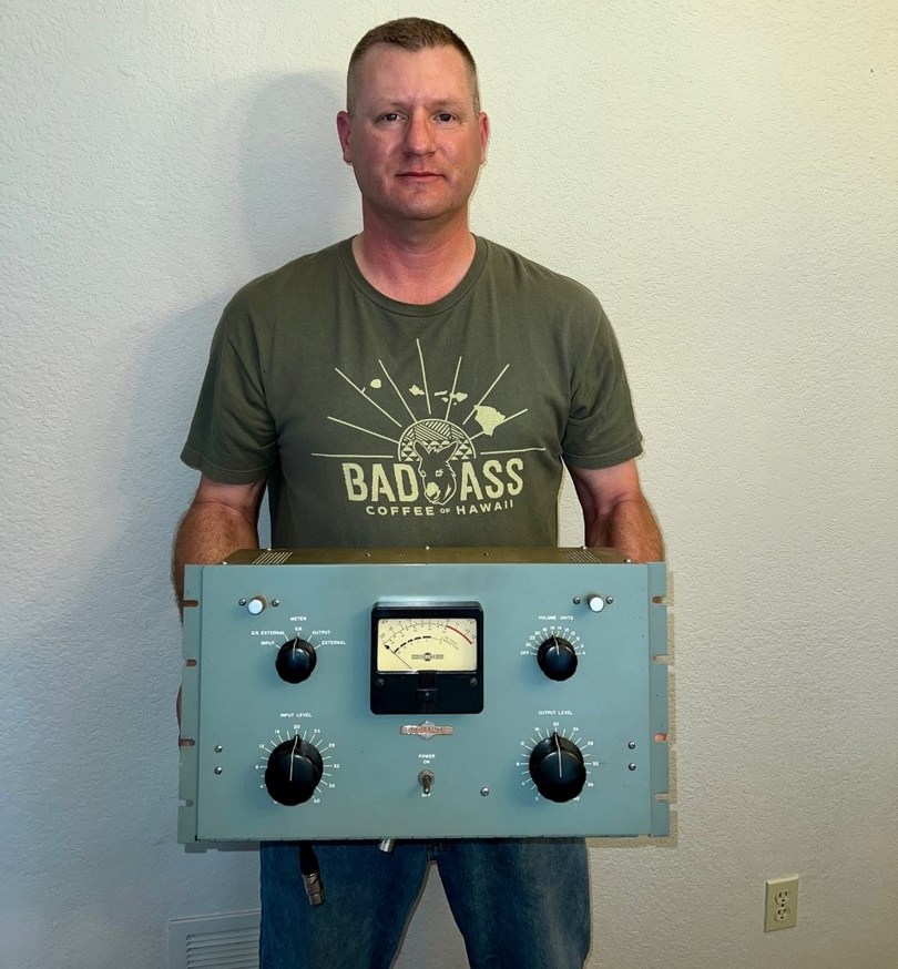 Joe Grandberg holding a blue Collins